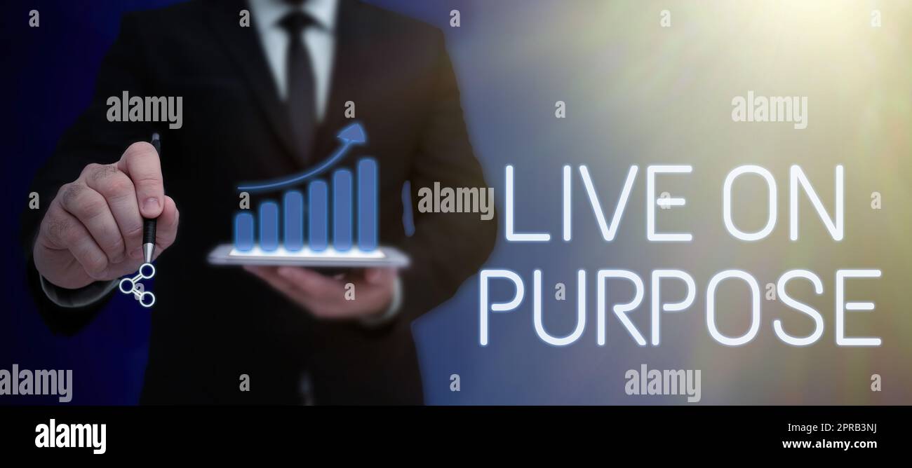 Writing displaying text Live On Purpose. Concept meaning Have a goal mission motivation to keep going inspiration Lady in suit holding pen symbolizing successful teamwork accomplishments. Stock Photo