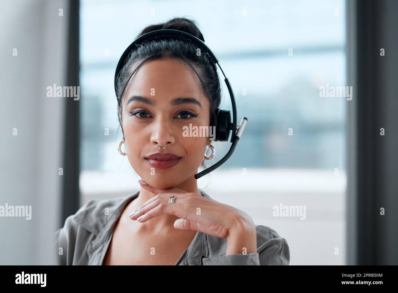 Customer service is a tough job. a young female call center worker