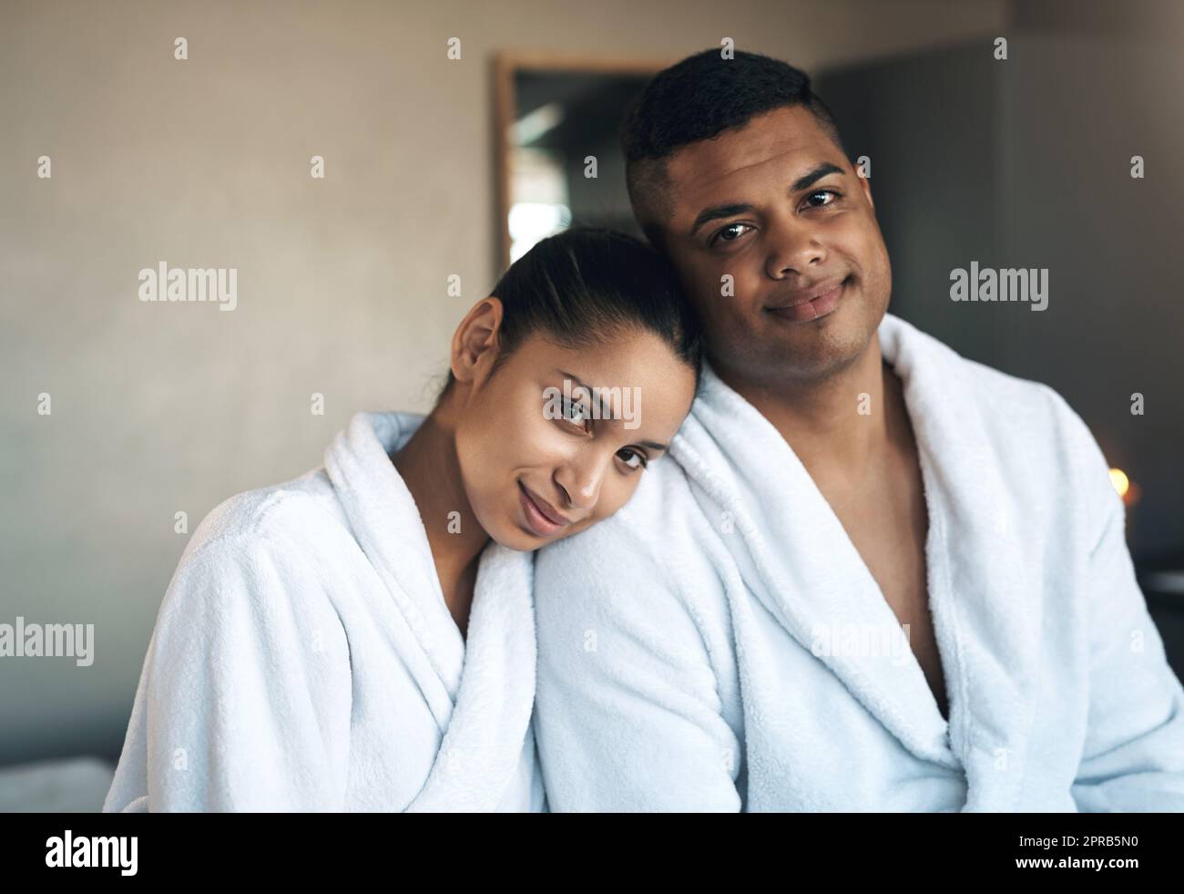 We came here to unwind and reconnect. Portrait of a young couple at a spa. Stock Photo