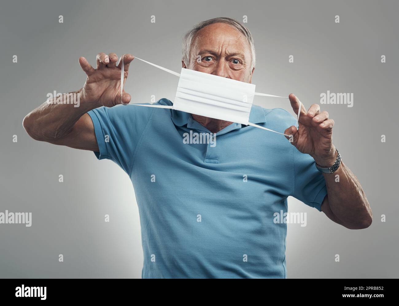 Man holding mask face hi-res stock photography and images - Alamy