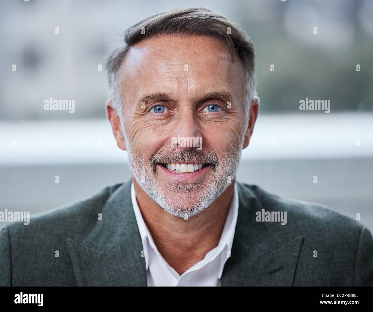 Before you are a leader, success is about growing yourself. Portrait of a confident mature businessman in an office. Stock Photo