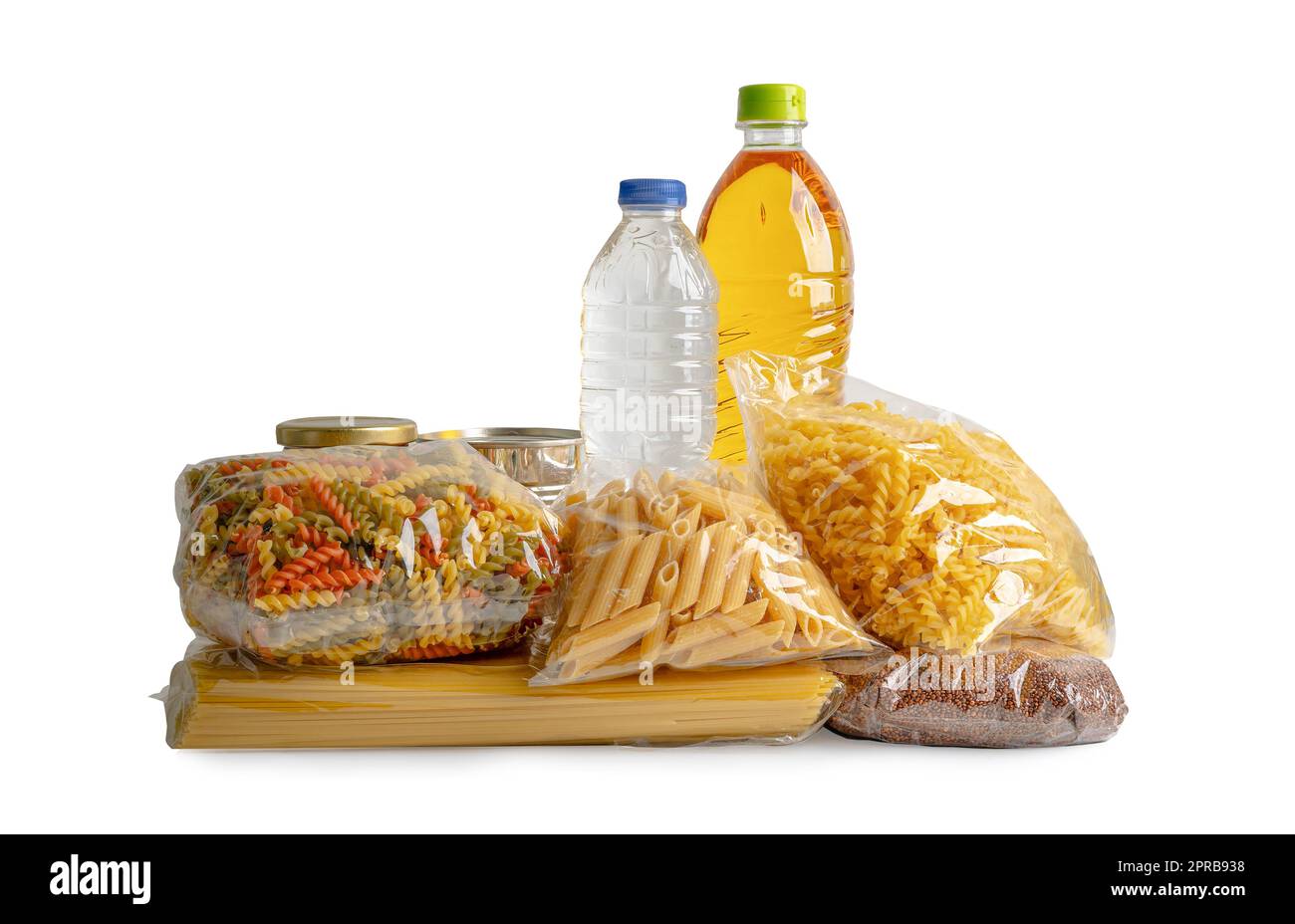 Foodstuff for donation, storage and delivery. Various food, pasta, cooking oil and canned food in cardboard box. Stock Photo