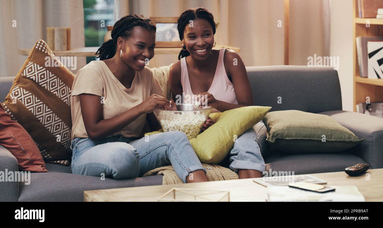 My best friend is my special person for life. two friends relaxing and hanging out on the couch at home. Stock Photo