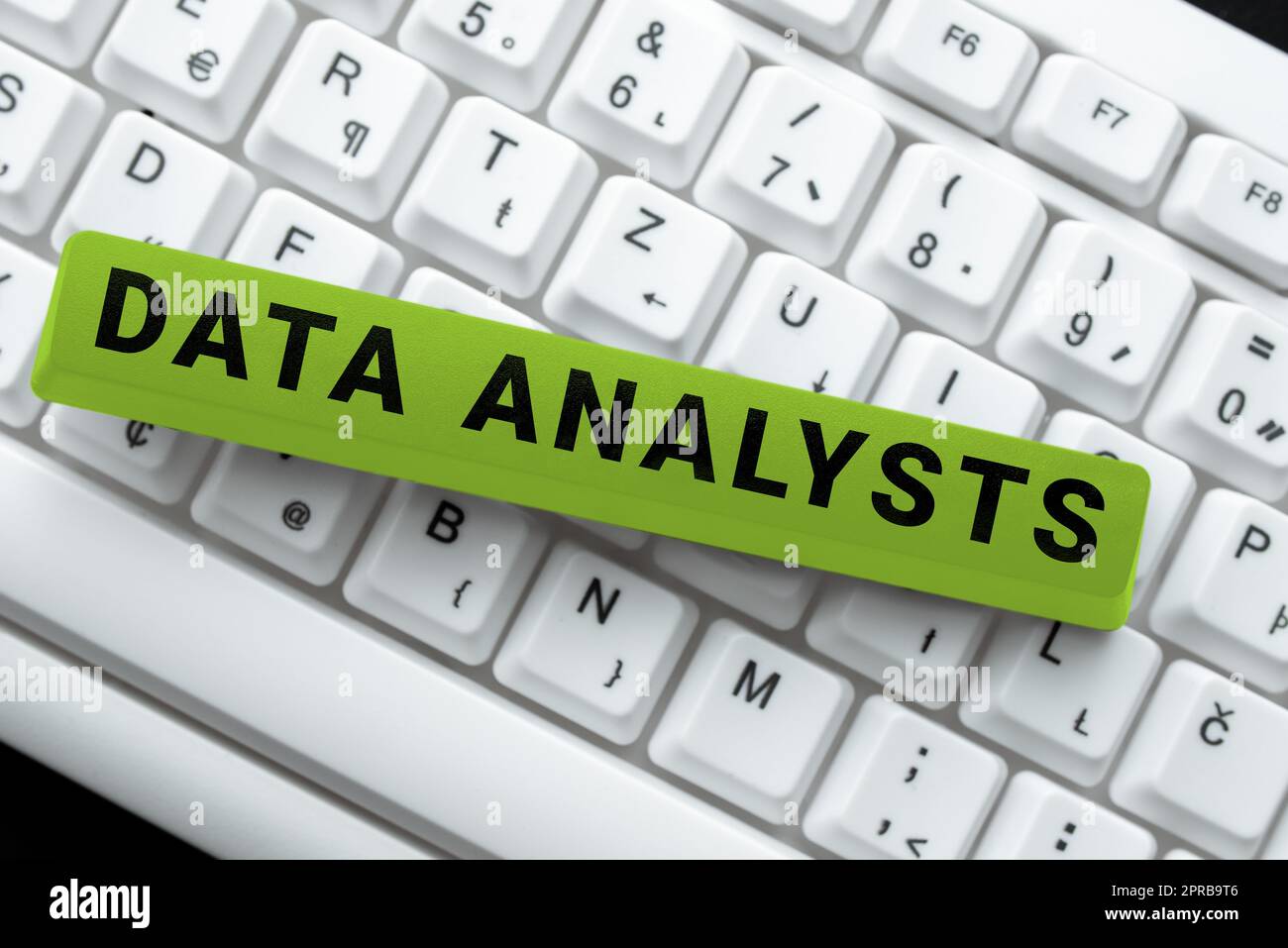 Sign displaying Data Analysts. Business idea Programmer Design and Create Report Identifies patterns -49195 Stock Photo