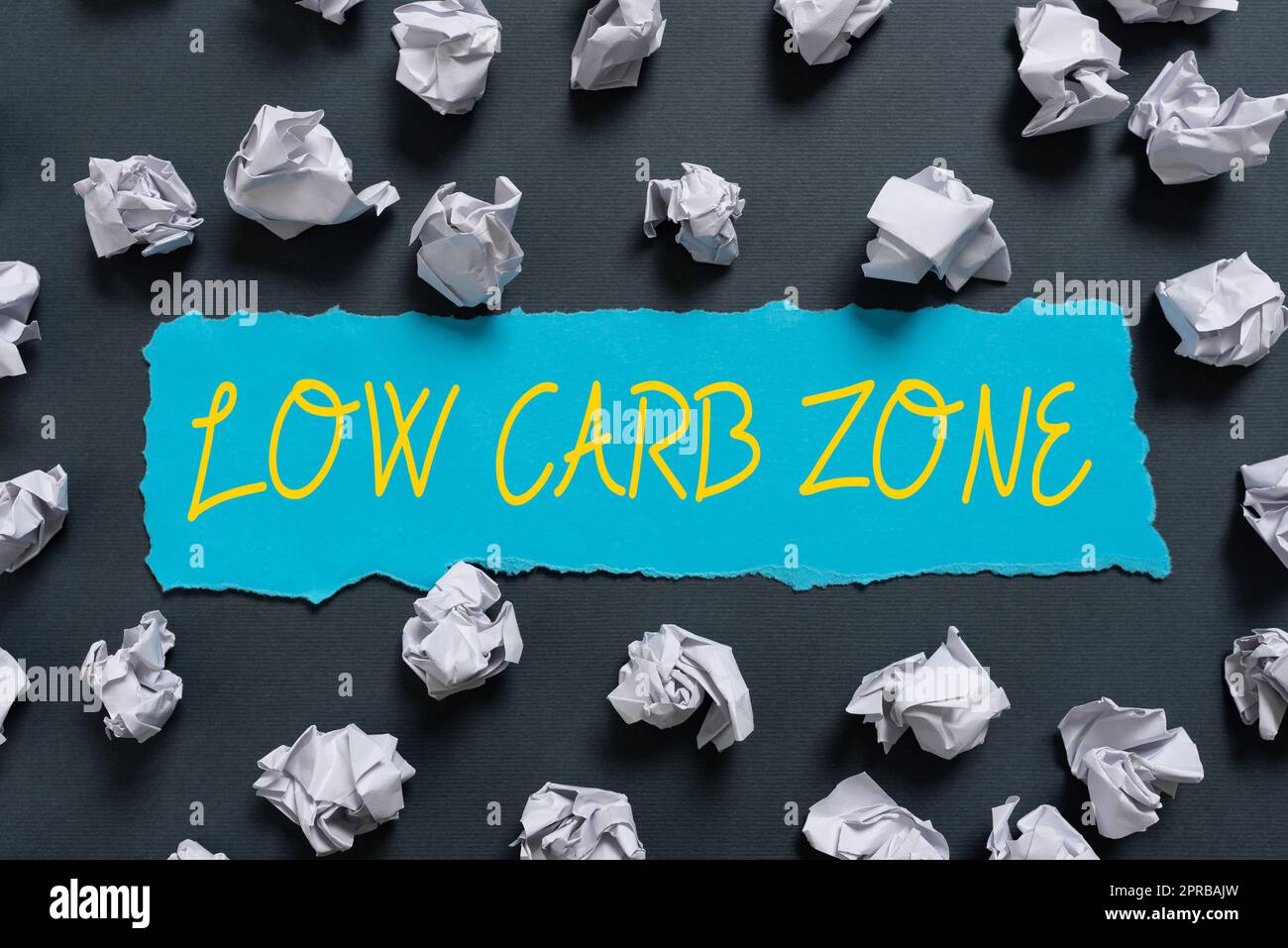 Text caption presenting Low Carb Zone. Business concept Healthy diet for losing weight eating more proteins sugar free Crumpled Notes Placed All Over Written Important Informations On Paper. Stock Photo