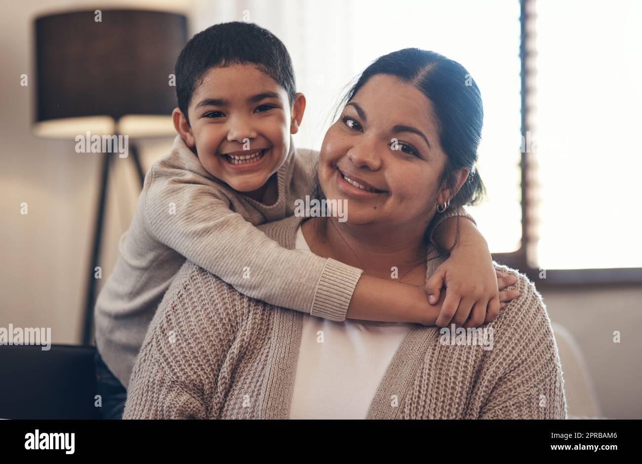 A boys best friend is his mamma. Portrait of an adorable little boy spending quality time with his mother at home. Stock Photo