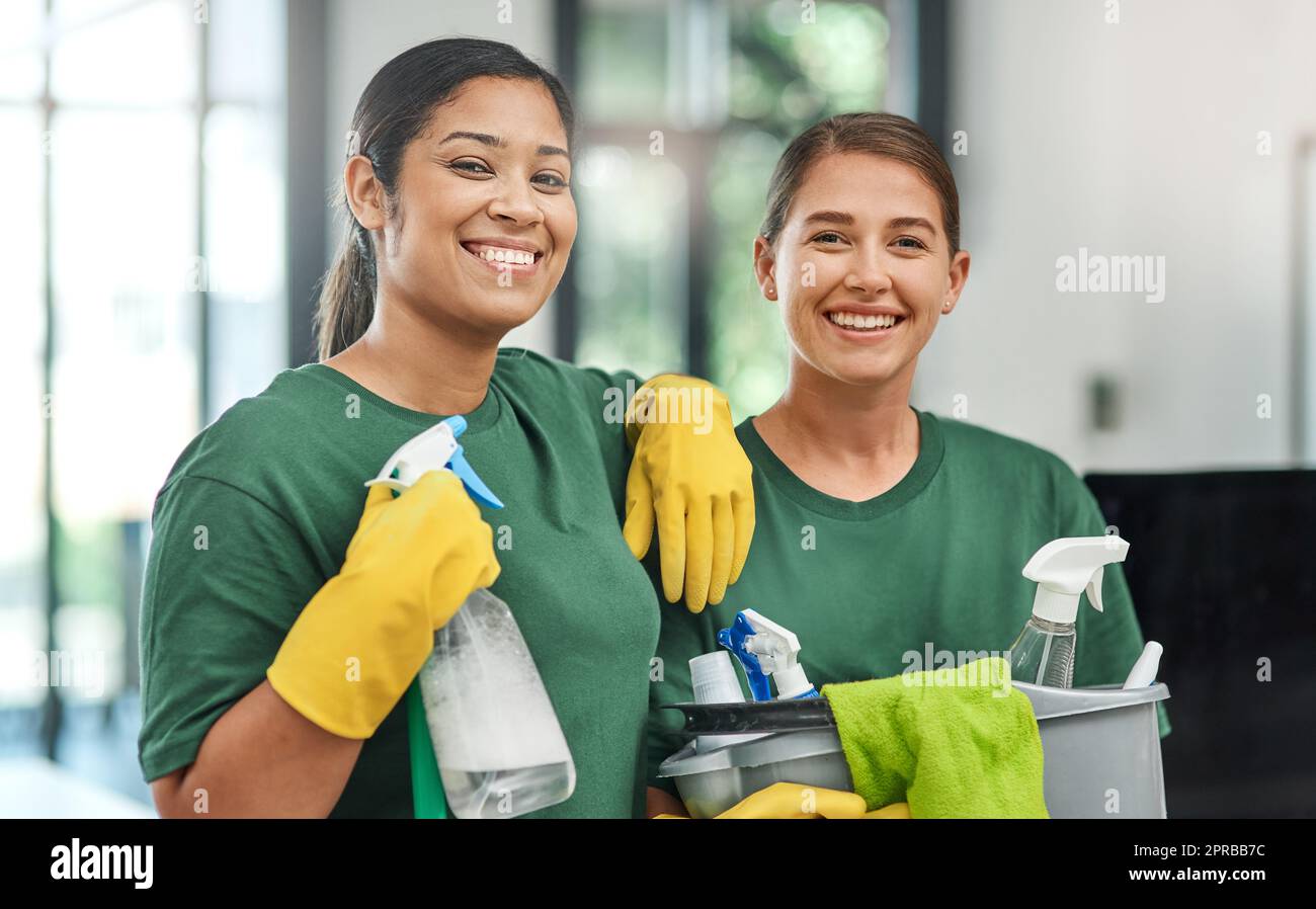 The best team to keep your office clean. Portrait of two young woman