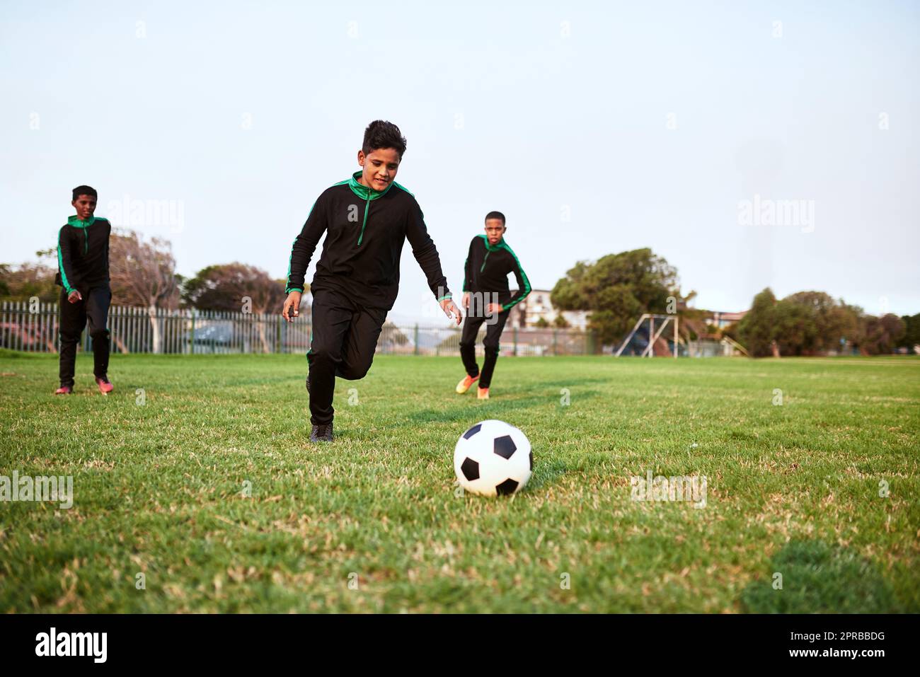Soccer develops agility, speed and stamina. a group of young boys