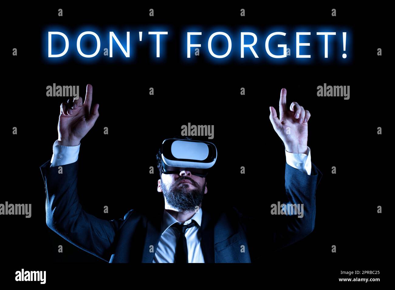 Text caption presenting Don T Not Forget. Business idea Know by Heart Think Back Fix in the Mind Refresh Memory Man Wearing Virtual Reality Simulator Raising Hand During Training. Stock Photo