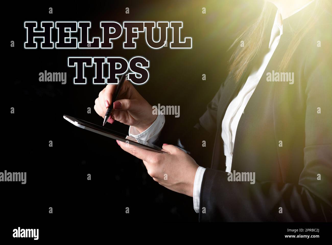 Sign displaying Helpful Tips. Business showcase Useful secret Information Advice given to accomplish something Businesswoman Holding Tablet In One Hand And Pointing With Pen On It Stock Photo
