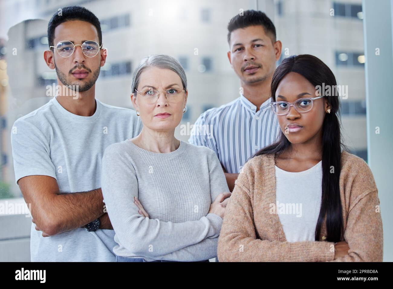 Every day at work is better than the last. a diverse team of coworkers together in their office at work. Stock Photo