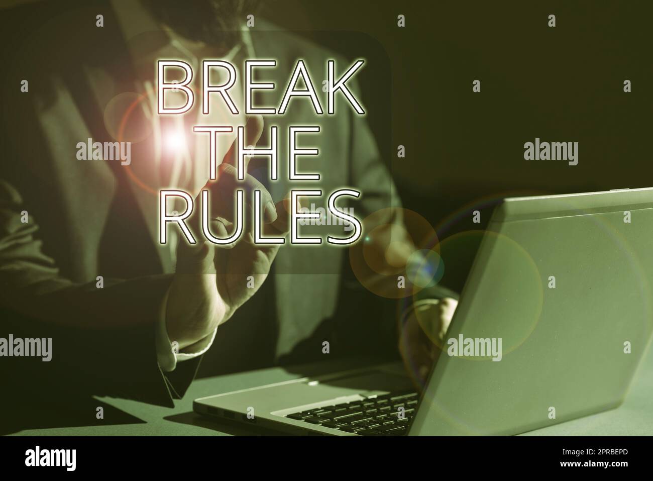 Conceptual caption Break The Rules. Business idea Make changes do everything different Rebellion Reform Man Typing Important Data Into Laptop And Pointing New Idea With One Finger Stock Photo