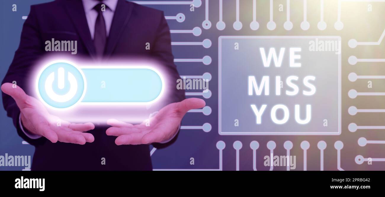 Conceptual caption We Miss You. Concept meaning Feeling sad because you are not here anymore loving message Man Showing Hands With On Power Button Receiving Ideas And Messages. Stock Photo