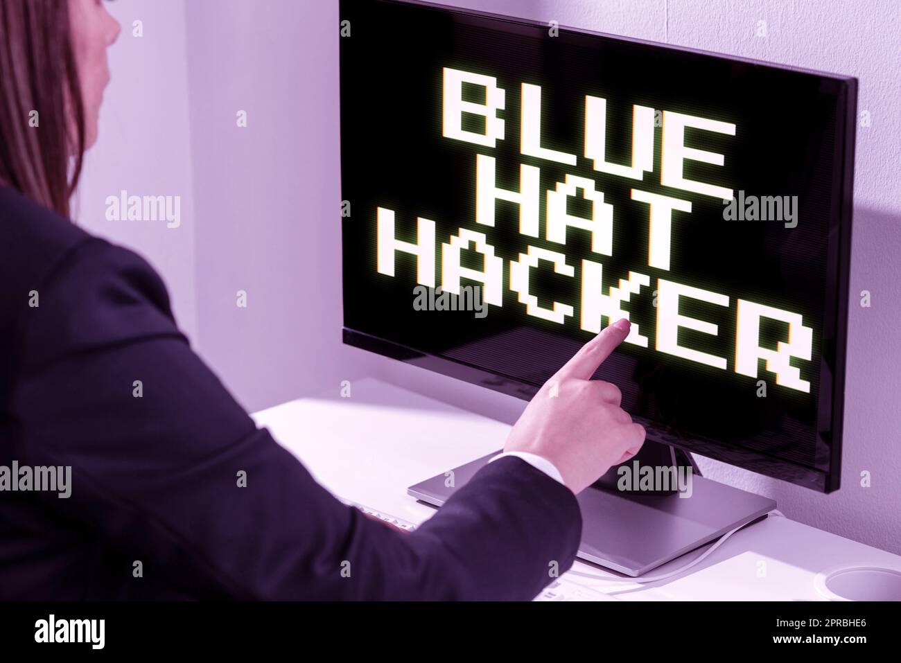 Conceptual caption Blue Hat Hacker. Business idea Person consulting firms who bug system prior to its launch Businesswoman Pointing Important Infortmation With One Finger On Computer. Stock Photo