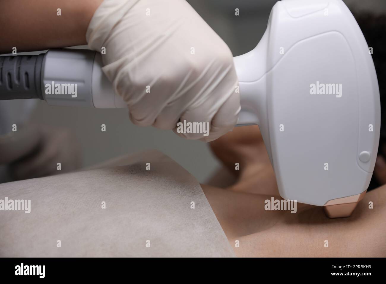 Epilation Radiology Woman undergoing laser epilation procedure, closeup view Stock Photo ...