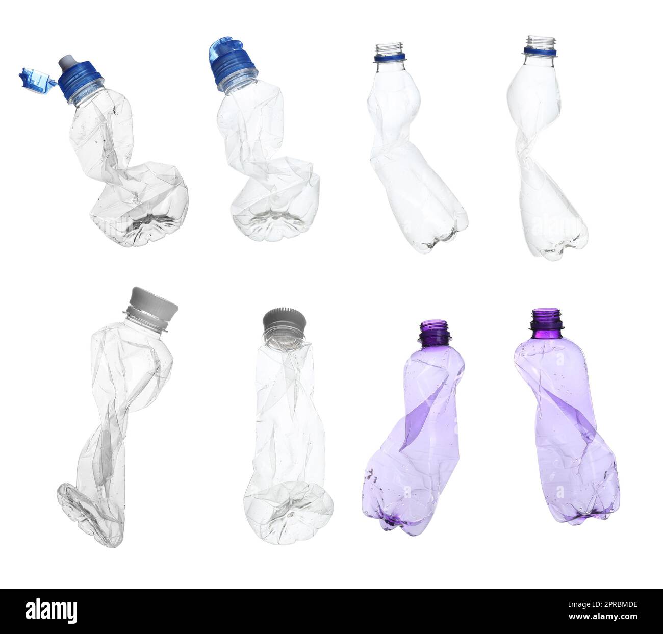 Set with empty crumpled bottles on white background Stock Photo - Alamy