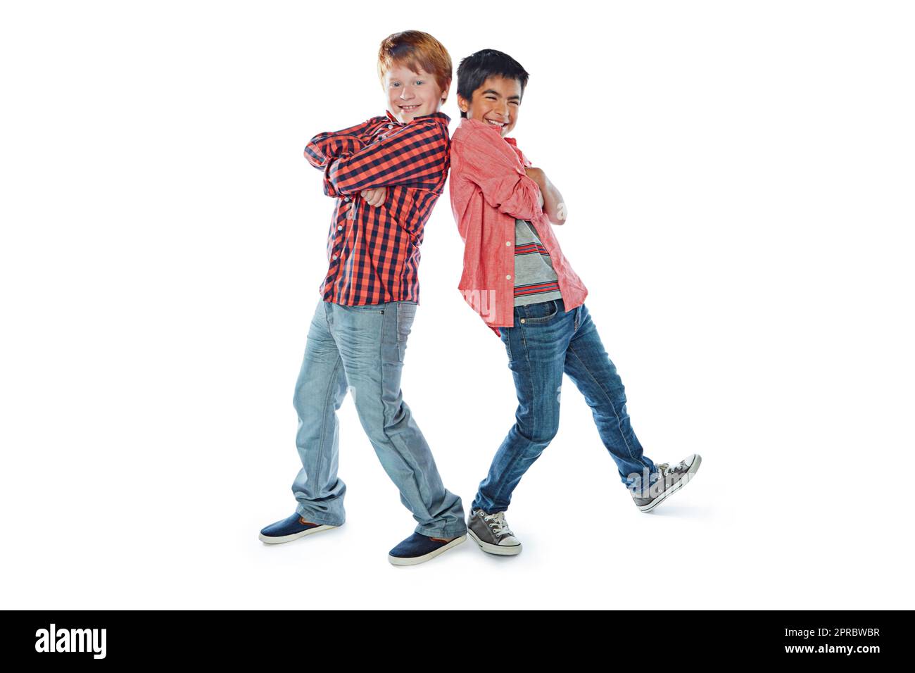 Dudes with tude. Studio portrait of two best friends standing back to ...