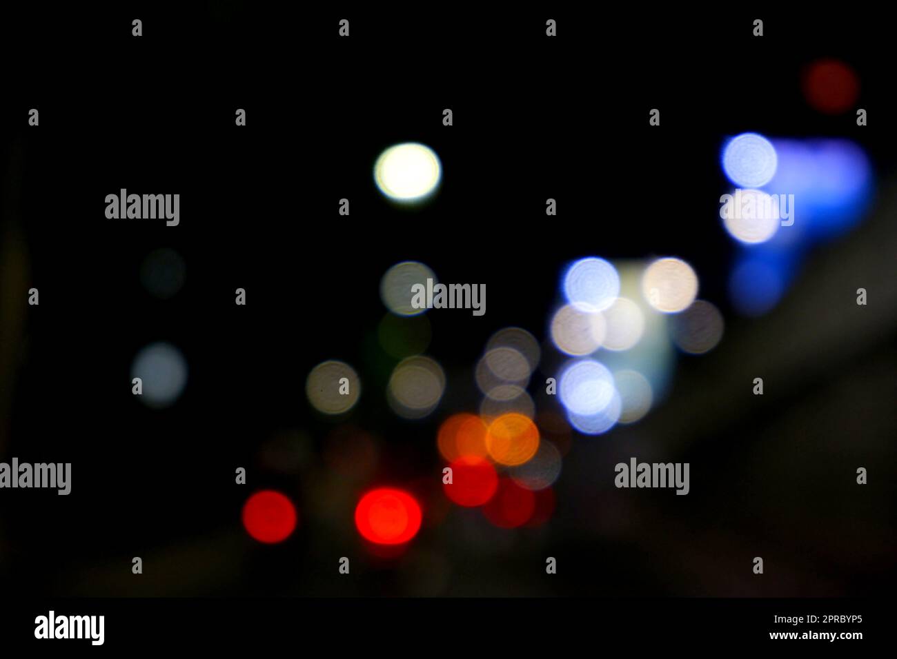 Blurred colorful bokeh light at night Stock Photo
