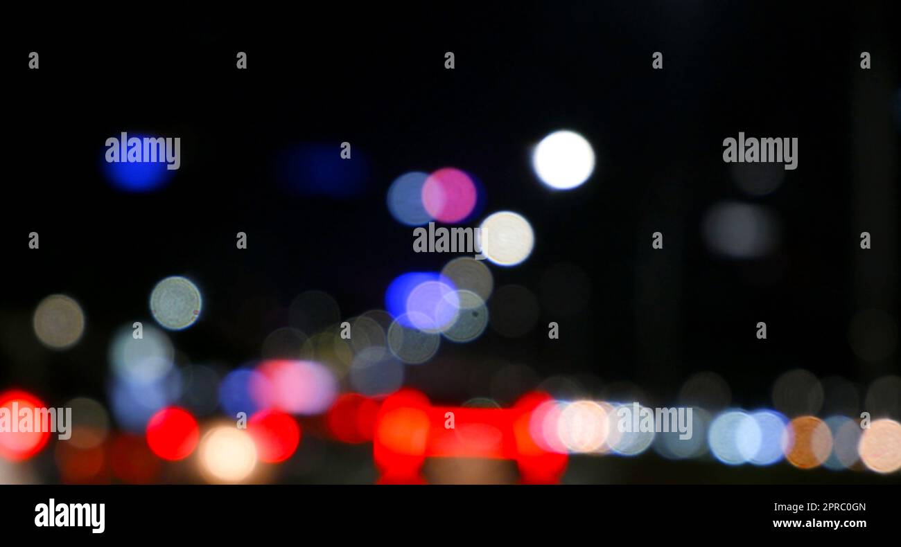 Blurred colorful bokeh light at night Stock Photo