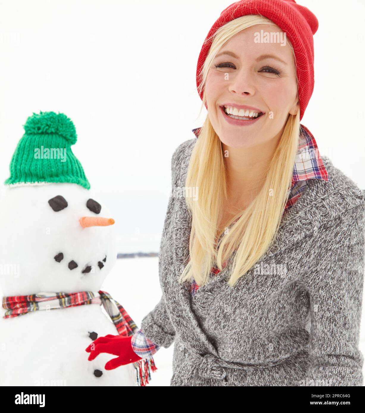 Her boyfriend was regretting not wearing his coat. a beautiful young