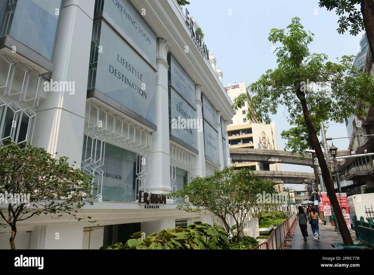 The Erawan shopping center and the Erawan Shrine on the corner of Ratchadamri Road and Phloen Chit Road in Bangkok, Thailand. Stock Photo