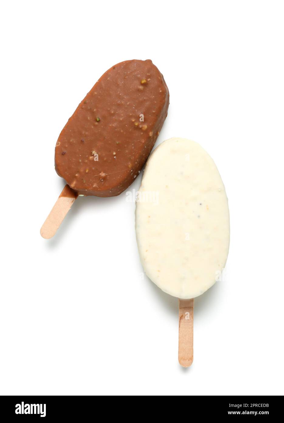 Different chocolate covered ice cream on stick against white background