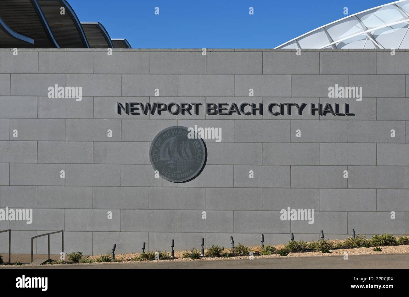 NEWPORT BEACH, CALIFORNIA - 21 APR 2023: Closeup of the Newport Beach City Hall sign and Seal, in the Civic Center. Stock Photo