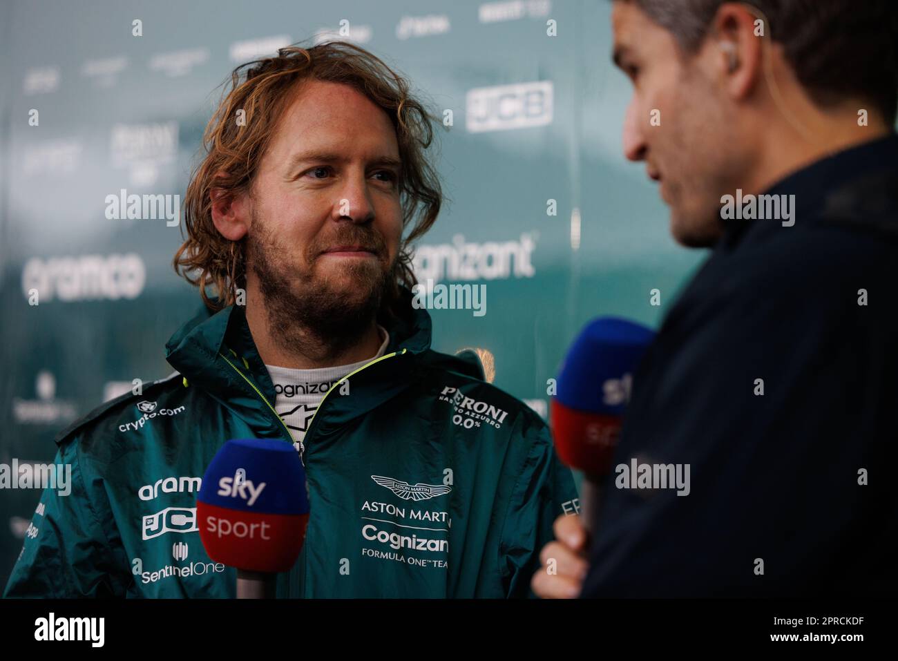 Sebastian Vettel bowing to the crowd at Suzuka Circuit