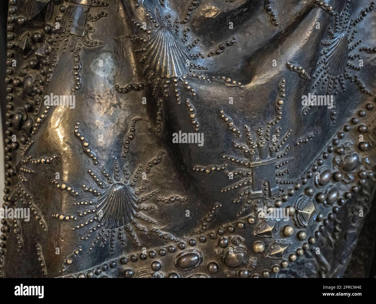 scallop shells on the bronze statue of Joanna the Mad of Spain, symbol of Spain and the Santiago pilgrimage Stock Photo