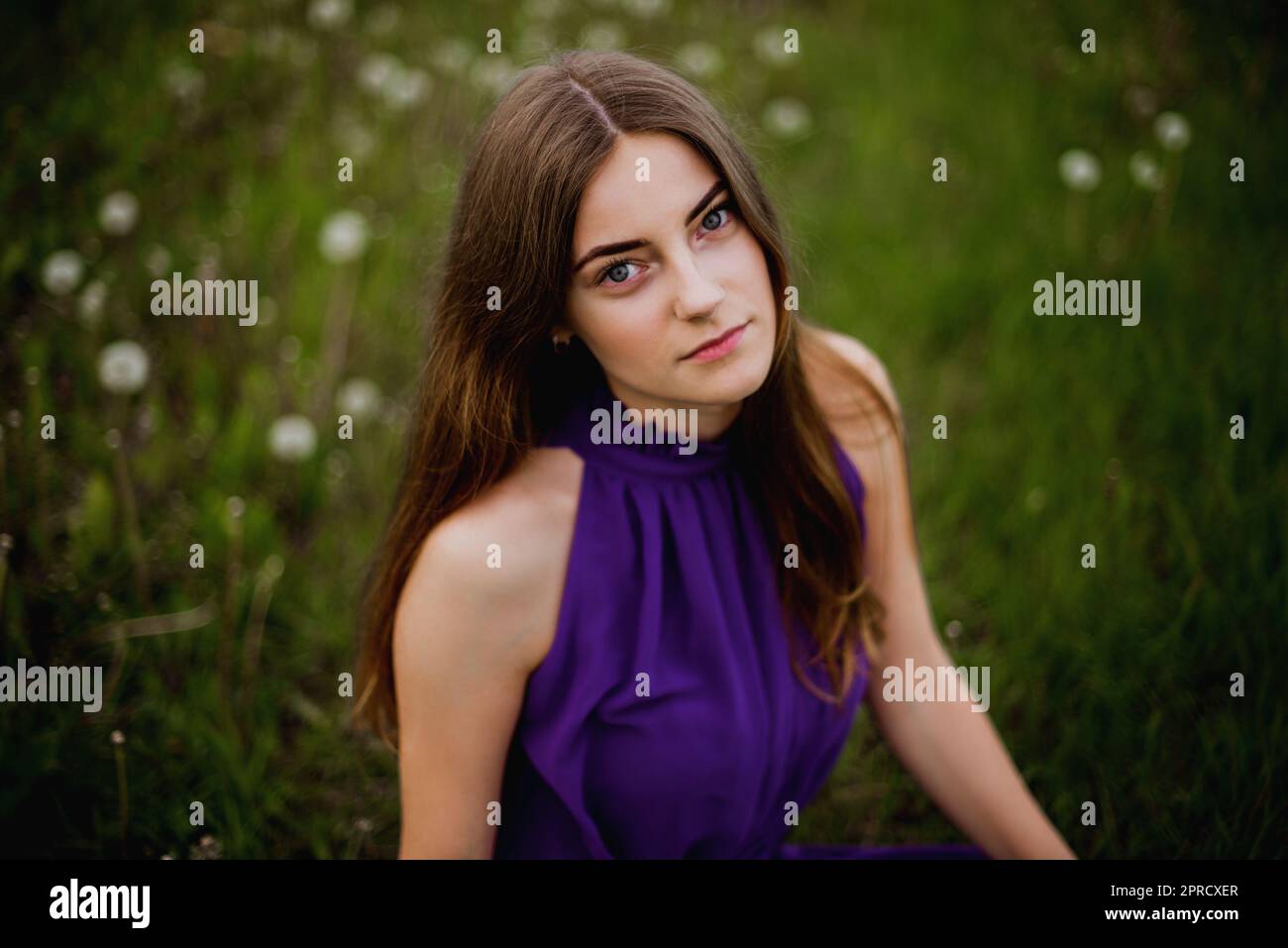 Girl in the flower field Stock Photo - Alamy
