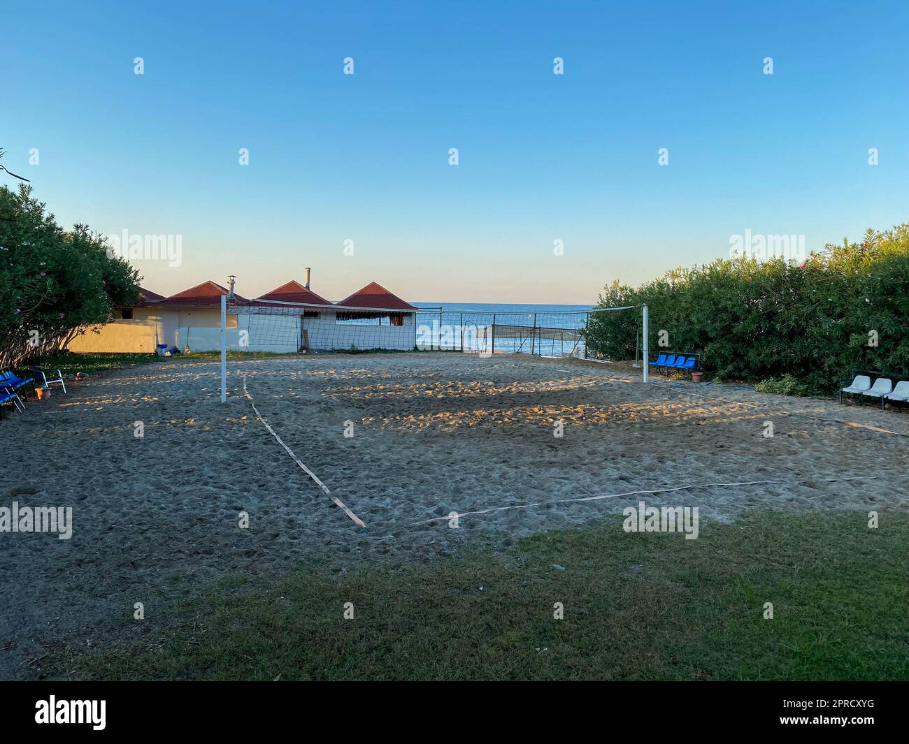 Volleyball court and beach on vacation in a heavenly warm eastern tropical country resort. Stock Photo