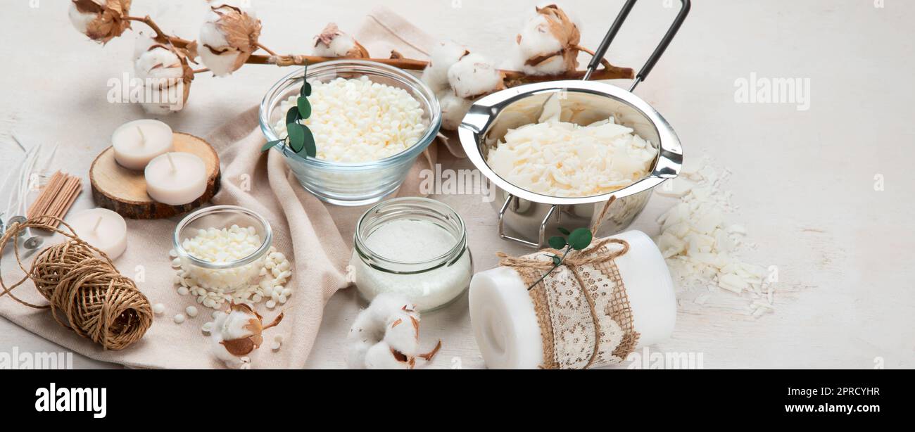 A set for homemade candles made of various types of wax and wicks. Idea