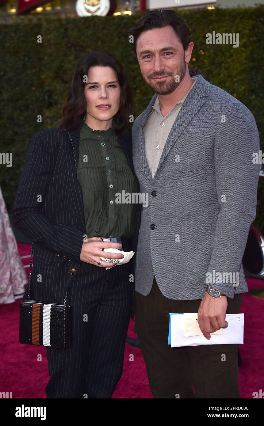Neve Campbell and JJ Feild arrive at the Los Angeles premiere of "Queen