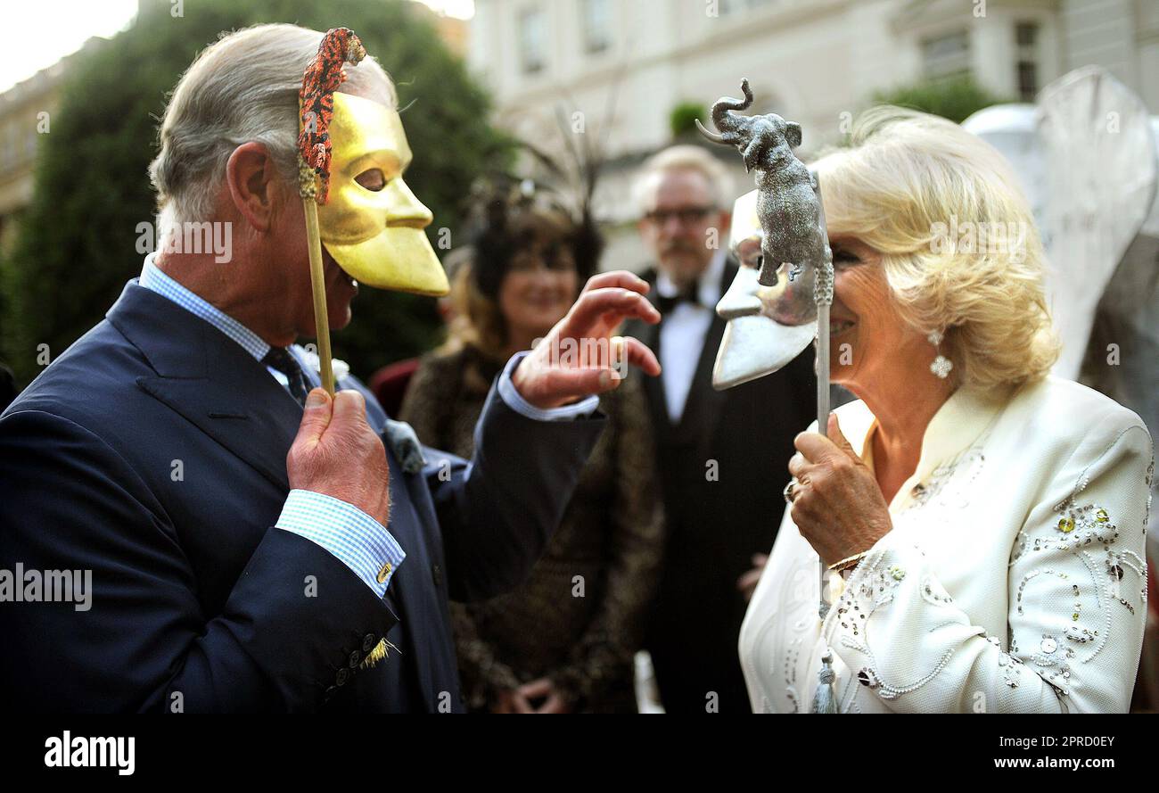 File photo dated 09/07/13 of the Prince of Wales and Duchess of Cornwall hosting a reception for the Elephant Family, a charity working to save the Asian Elephant from extinction in the wild. Photos from every year of the King's life have been compiled by the PA news agency, to celebrate Charles III's coronation. Issue date: Thursday April 27, 2023. Stock Photo