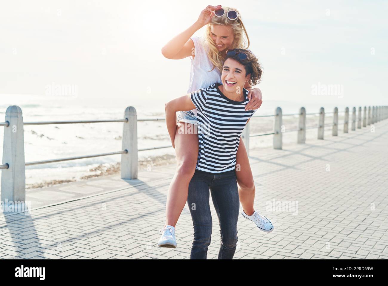 All you need is a good friend. two friends spending the day together on a sunny day. Stock Photo