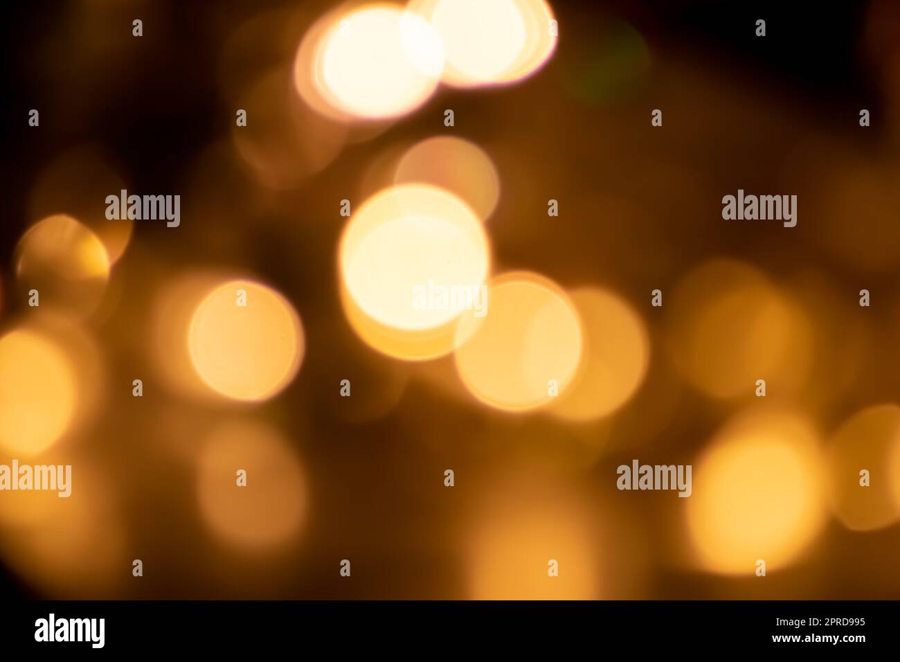 Shiny Christmas lights bokeh background with sparkling bokeh as blurry background for celebration party disco glitter or Christmas eve and a happy new year atmosphere with shining lights and circles Stock Photo