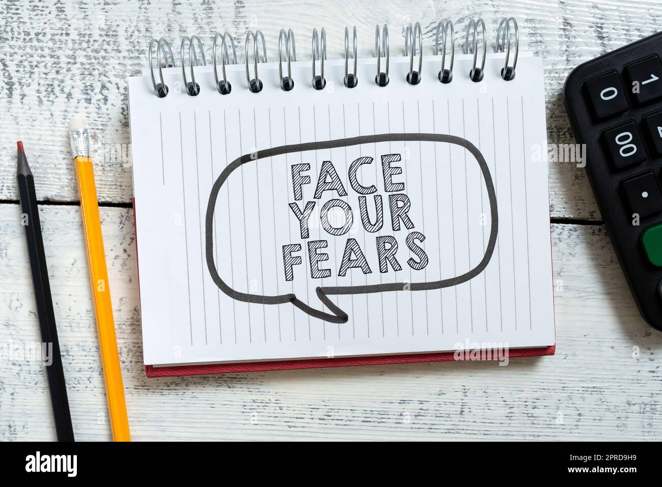 Inspiration showing sign Face Your Fears. Internet Concept Have the courage to overcome anxiety be brave fearless Speech Bubble With New Messages Written On Notebook On Floor. Stock Photo