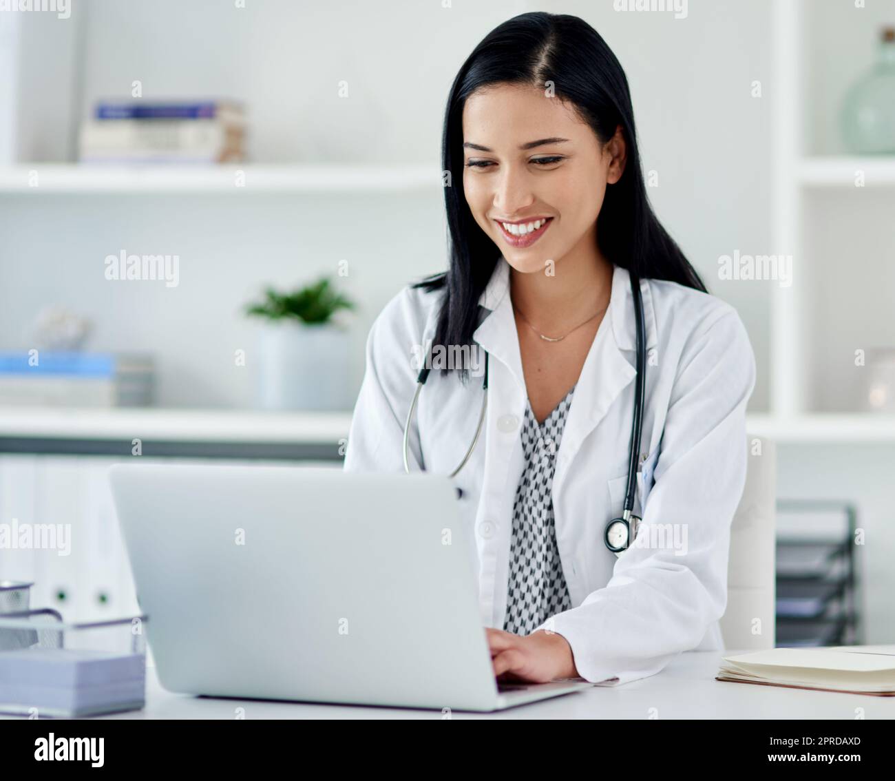 The right technology can make a quicker diagnosis. a young doctor using