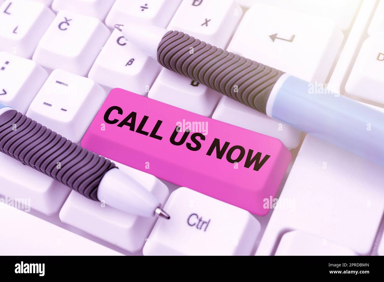 Writing displaying text Call Us Now. Business showcase Communicate by telephone to contact help desk support assistance -48618 Stock Photo