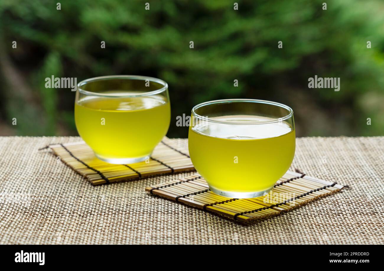 Cold Japanese green tea placed in a place with a view of the garden
