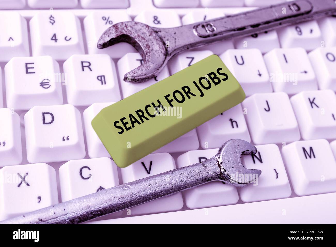 Handwriting text Search For Jobs. Word for Unemployed looking for new opportunities Headhunting Stock Photo