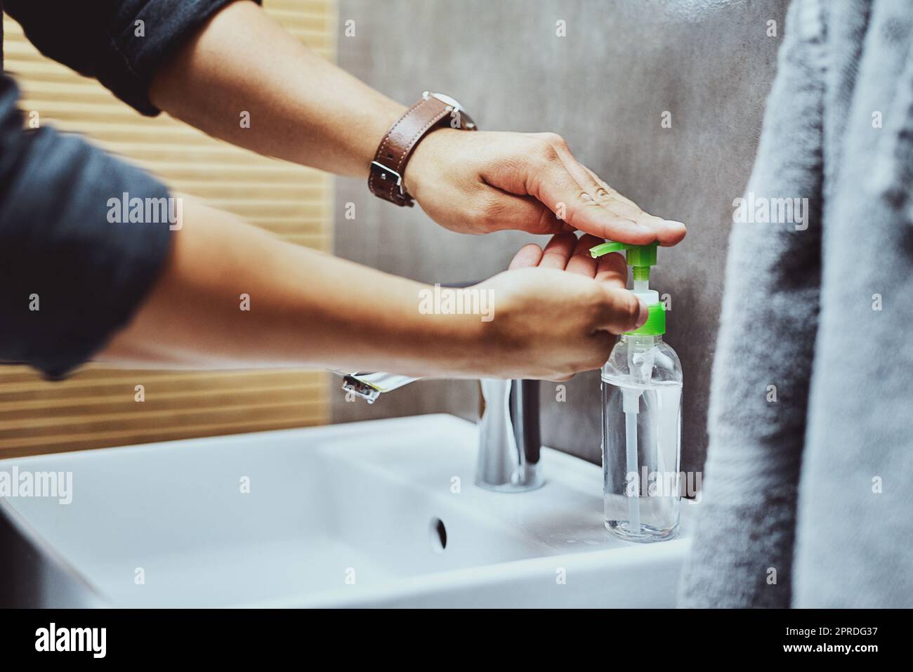 What are you doing to stop the spread. an unrecognisable man washing