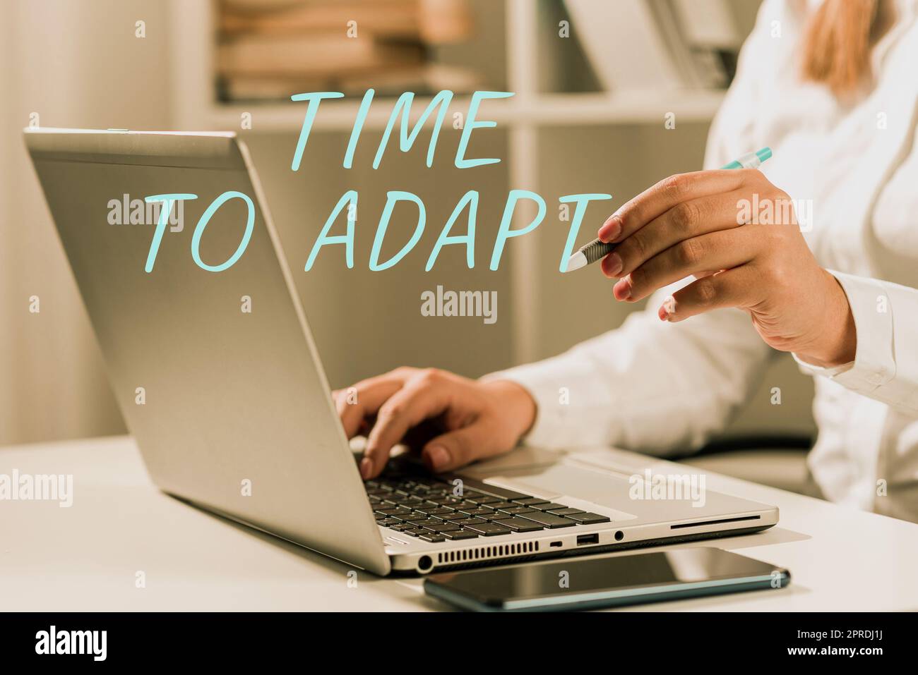Sign displaying Time To Adapt. Word for Moment to adjust oneself to changes Embrace innovation Woman Typing Updates On Lap Top And Pointing New Ideas With Pen. Stock Photo