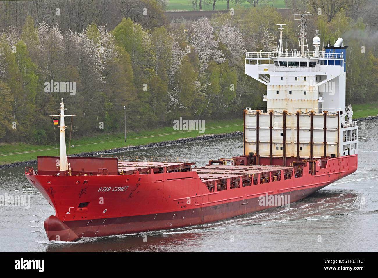 Containership STAR COMET passing the Kiel Canal Stock Photo