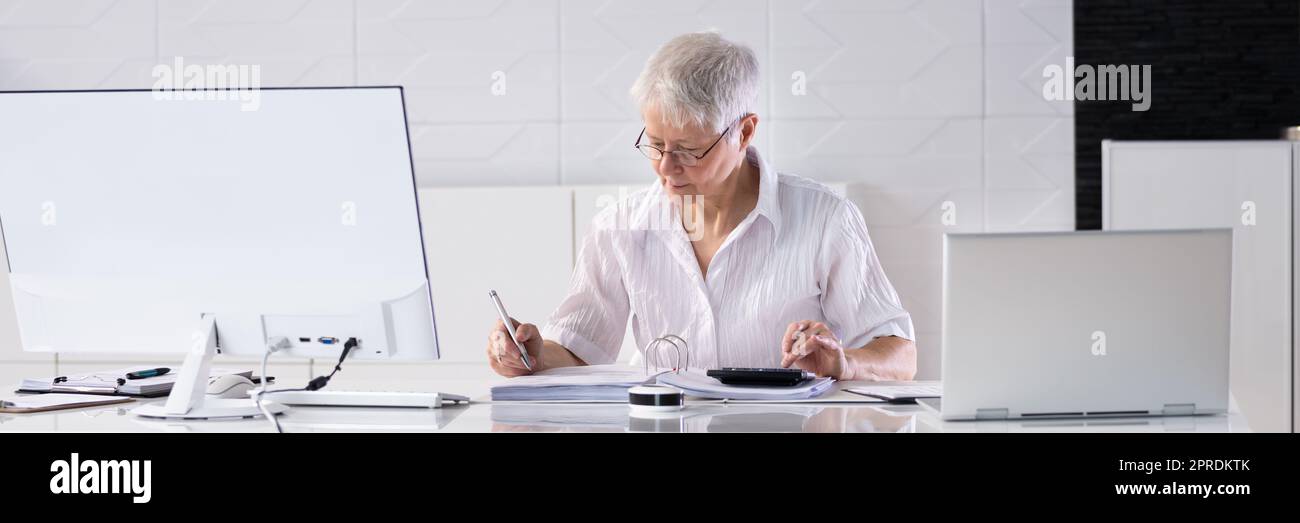 Business Accountant Using Calculator Stock Photo - Alamy