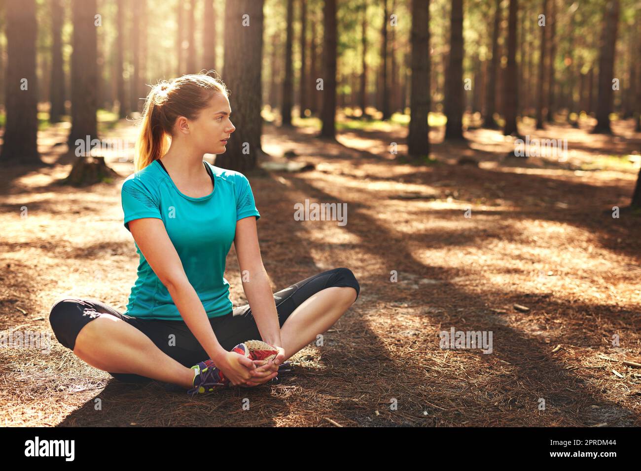 The beauty is just so inspiring. a sporty young woman spending the day out in nature. Stock Photo
