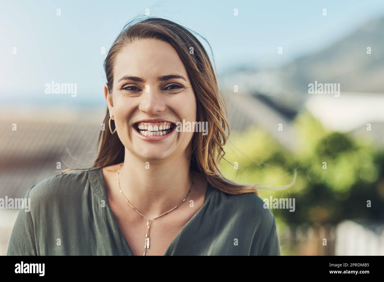 Happy girls are the prettiest. Portrait of a cheerful young woman