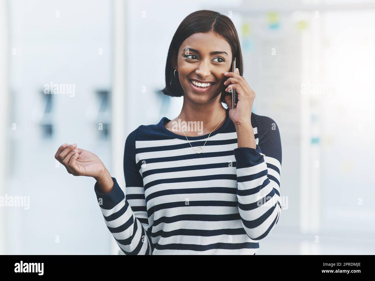 I look forward to further successful dealings with you. a young businesswoman making phone calls in her office. Stock Photo