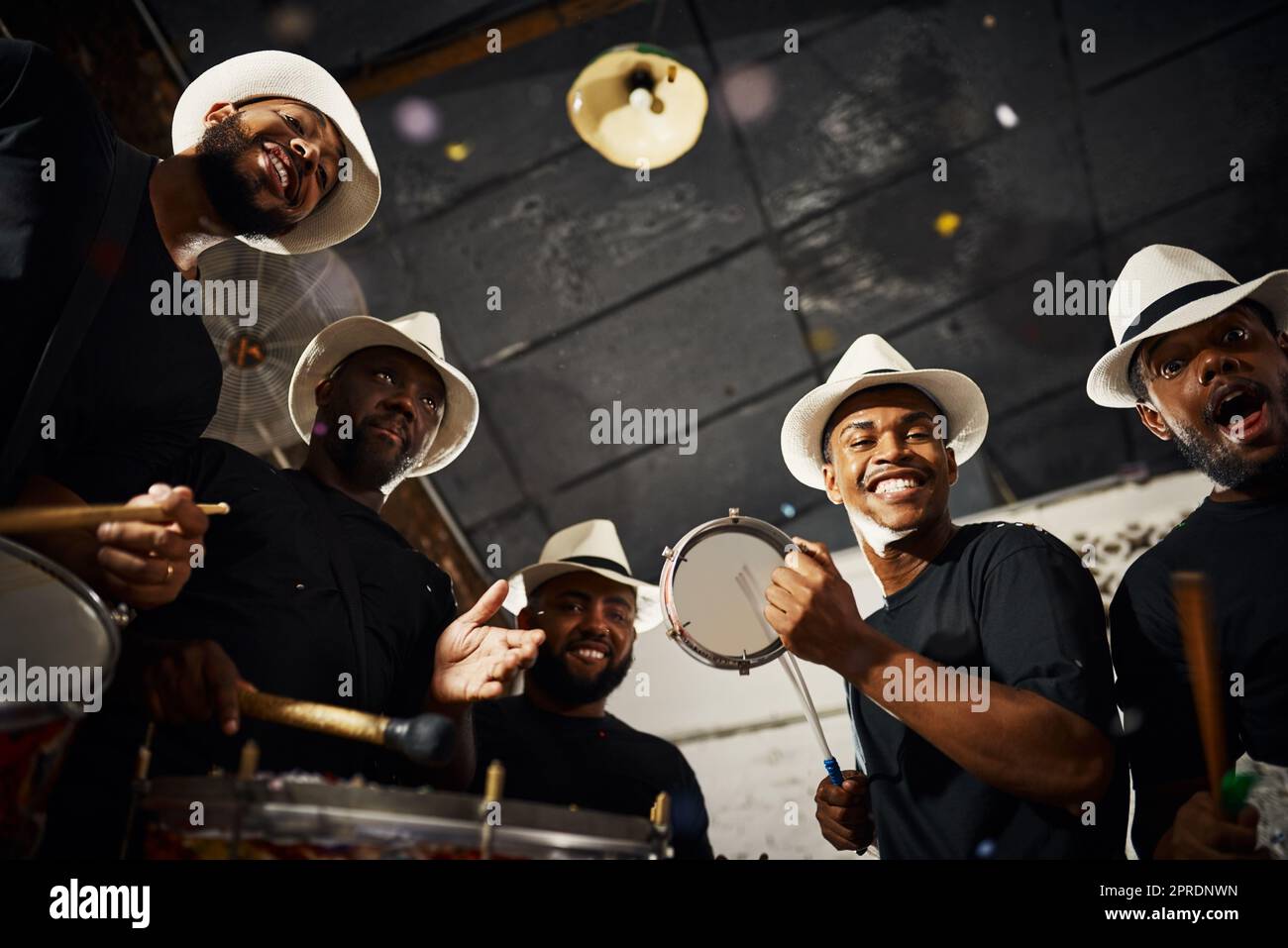 African man playing drums hi-res stock photography and images - Alamy