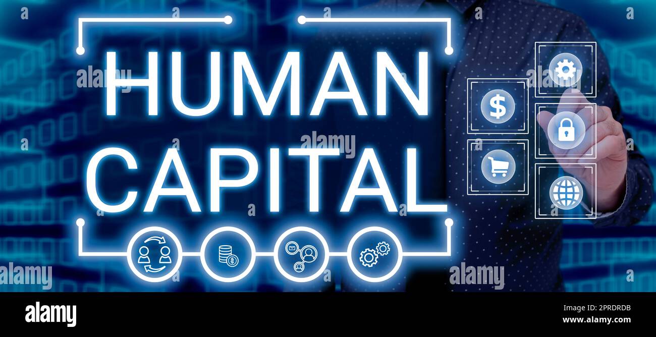 Hand writing sign Human Capital. Word for Intangible Collective Resources Competence Capital Education Man With Pen Pointing On Digital Signs And Presenting Crucial Information. Stock Photo